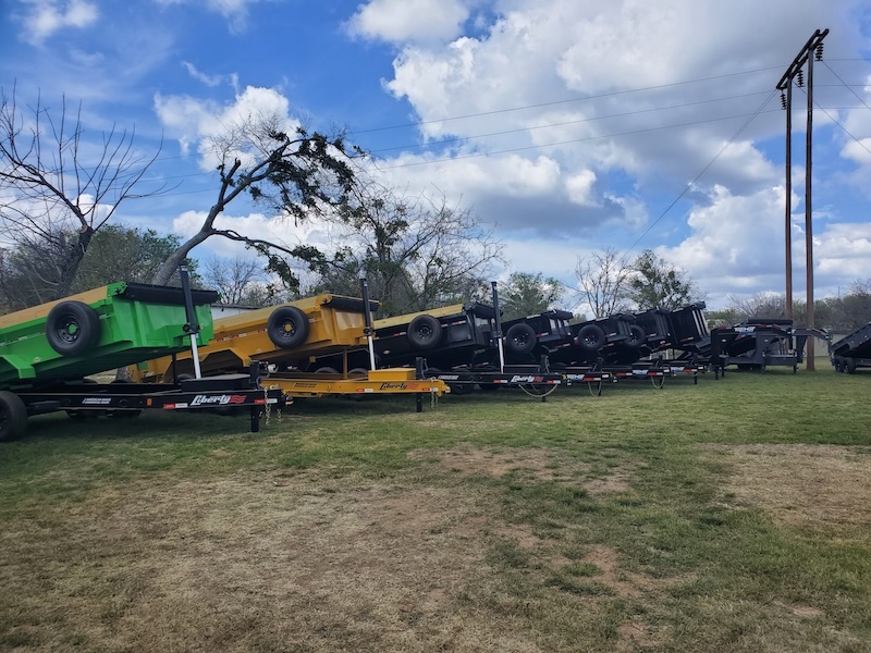 Liberty dump trailers on the Never Satisfied Motorsports lot in Weatherford, Texas