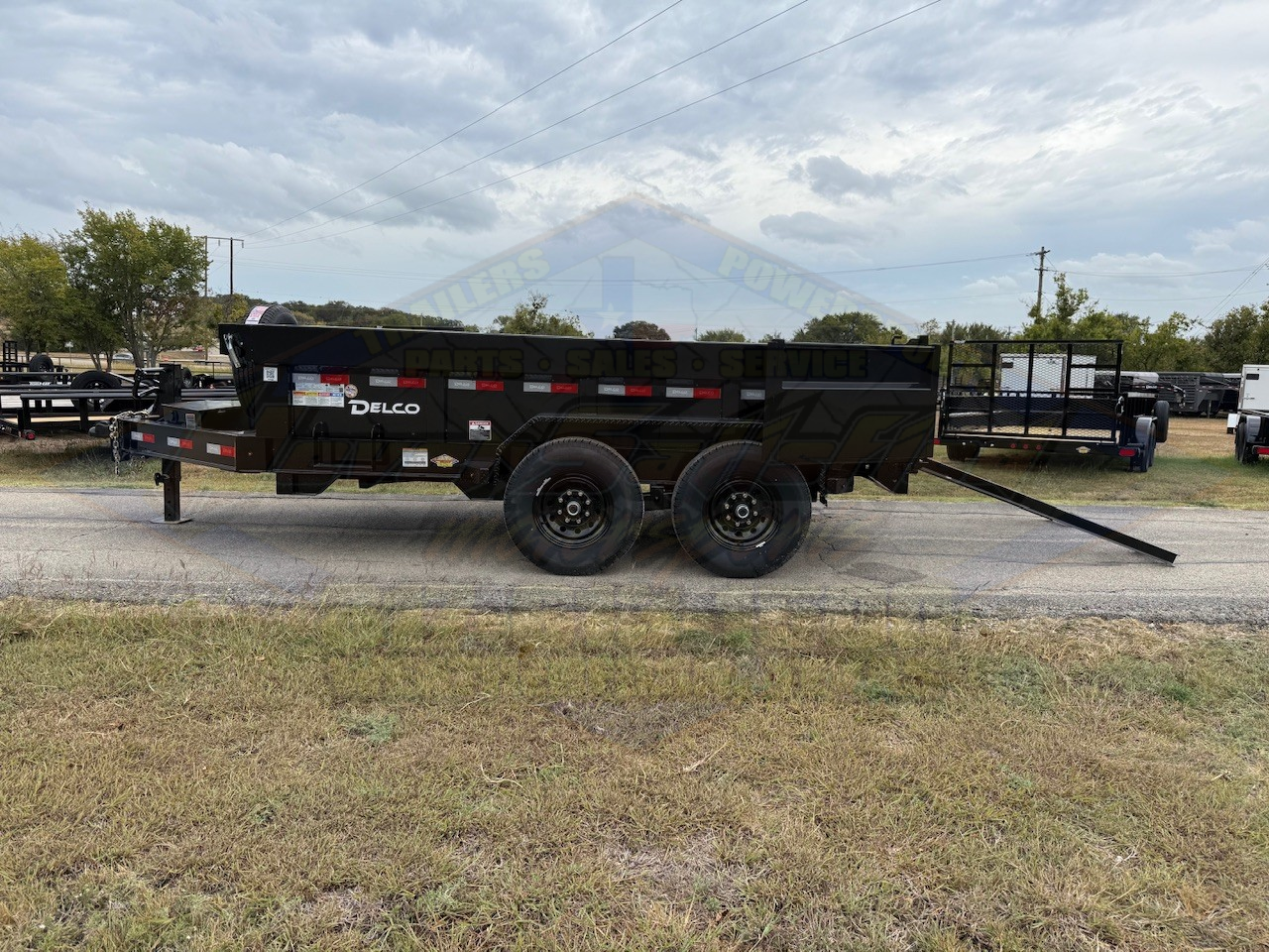 2025 DELCO 83" X 12' DUMP TRAILER WITH TARP, RAMPS AND SPARE 14,000 GVWR - Image 10